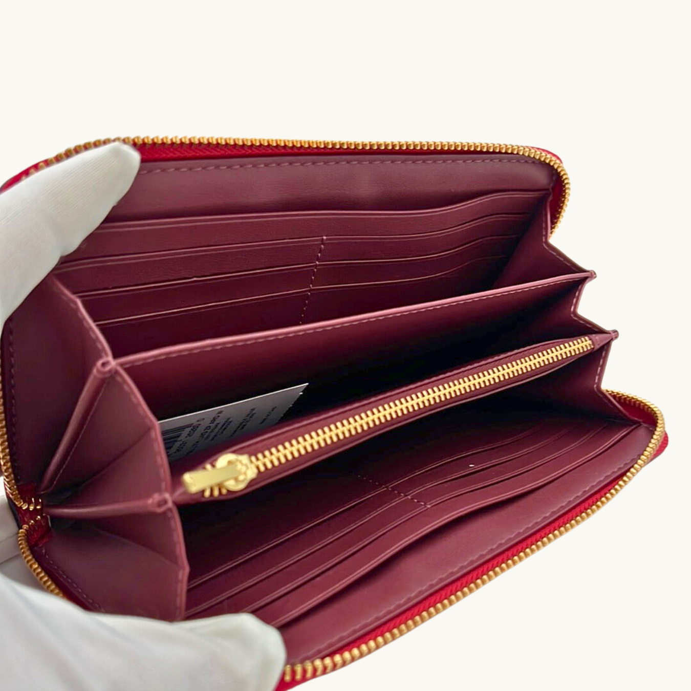 コーチ 長財布 / LONG ZIP AROUND WALLET / レッド ペブルレザー