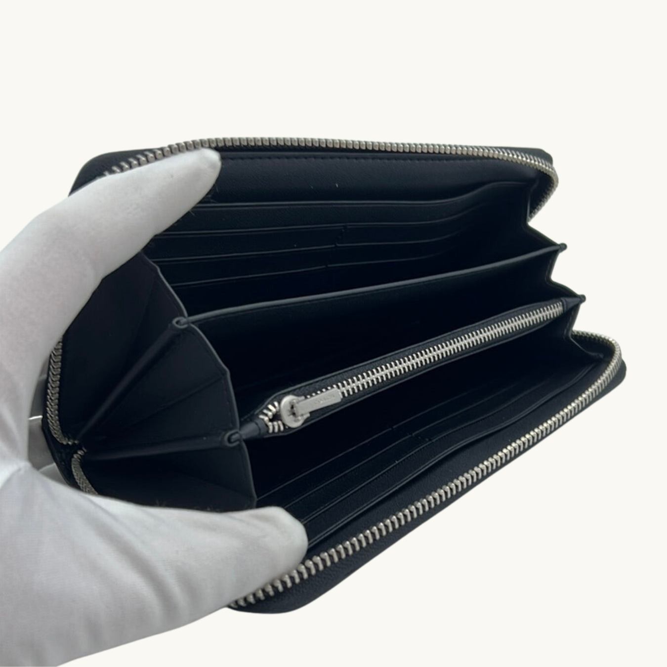コーチ 長財布 / LONG ZIP AROUND WALLET / ブラック ペブルレザー / シルバー金具