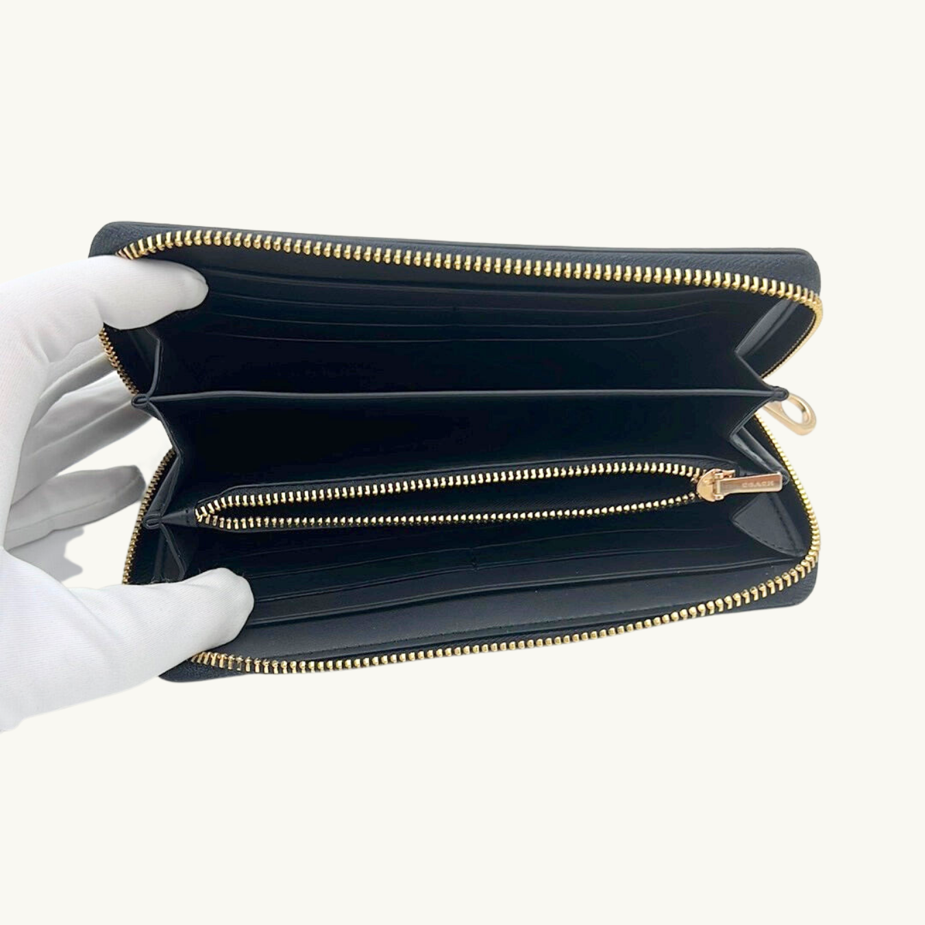 コーチ 長財布 / LONG ZIP AROUND WALLET / カーキ ブラック シグネチャーキャンバス